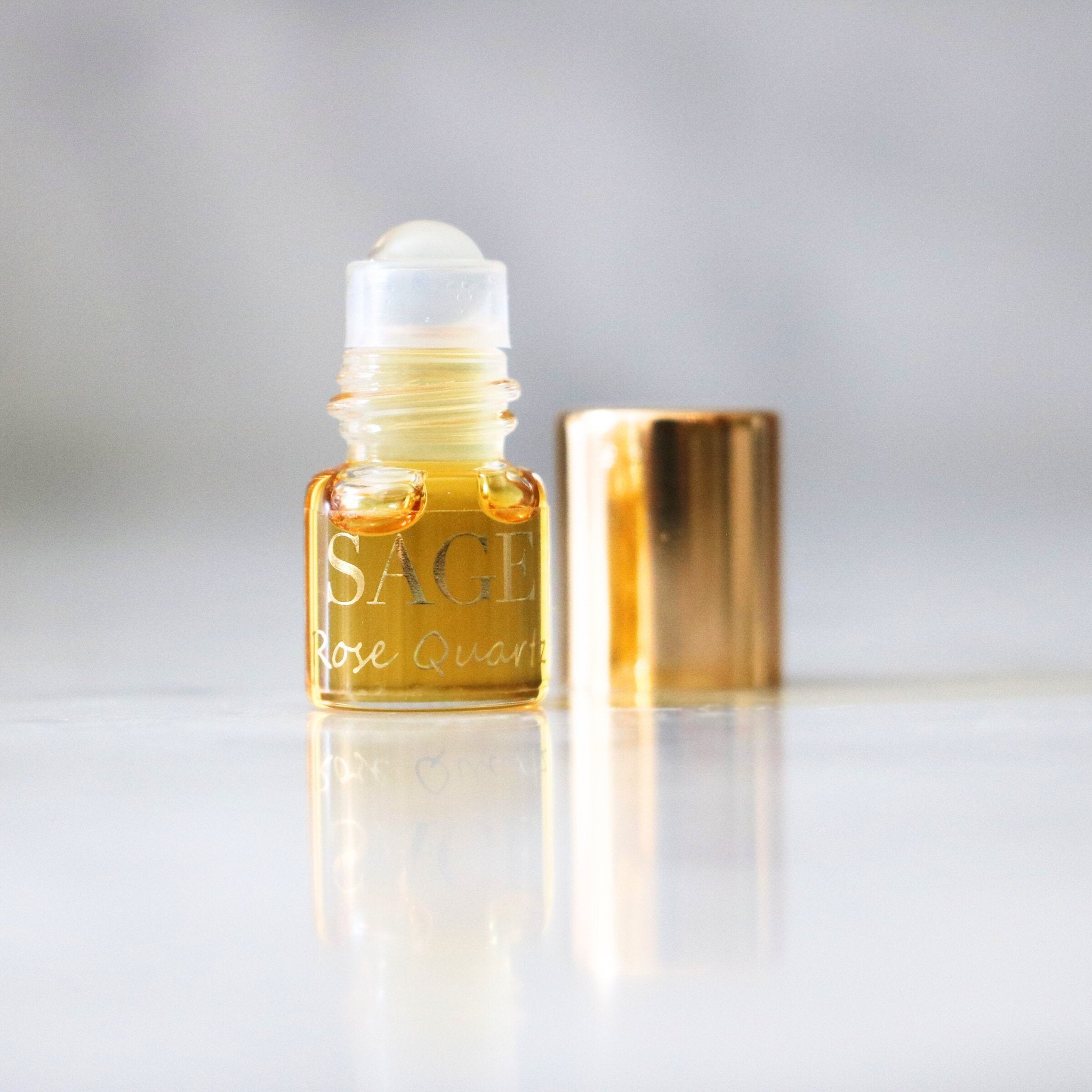 .03oz Mini Roll on Sage Rose Quartz Perfume Oil light floral,Gender Neutral Vegan,Cruelty Free, and travel-size fragrance