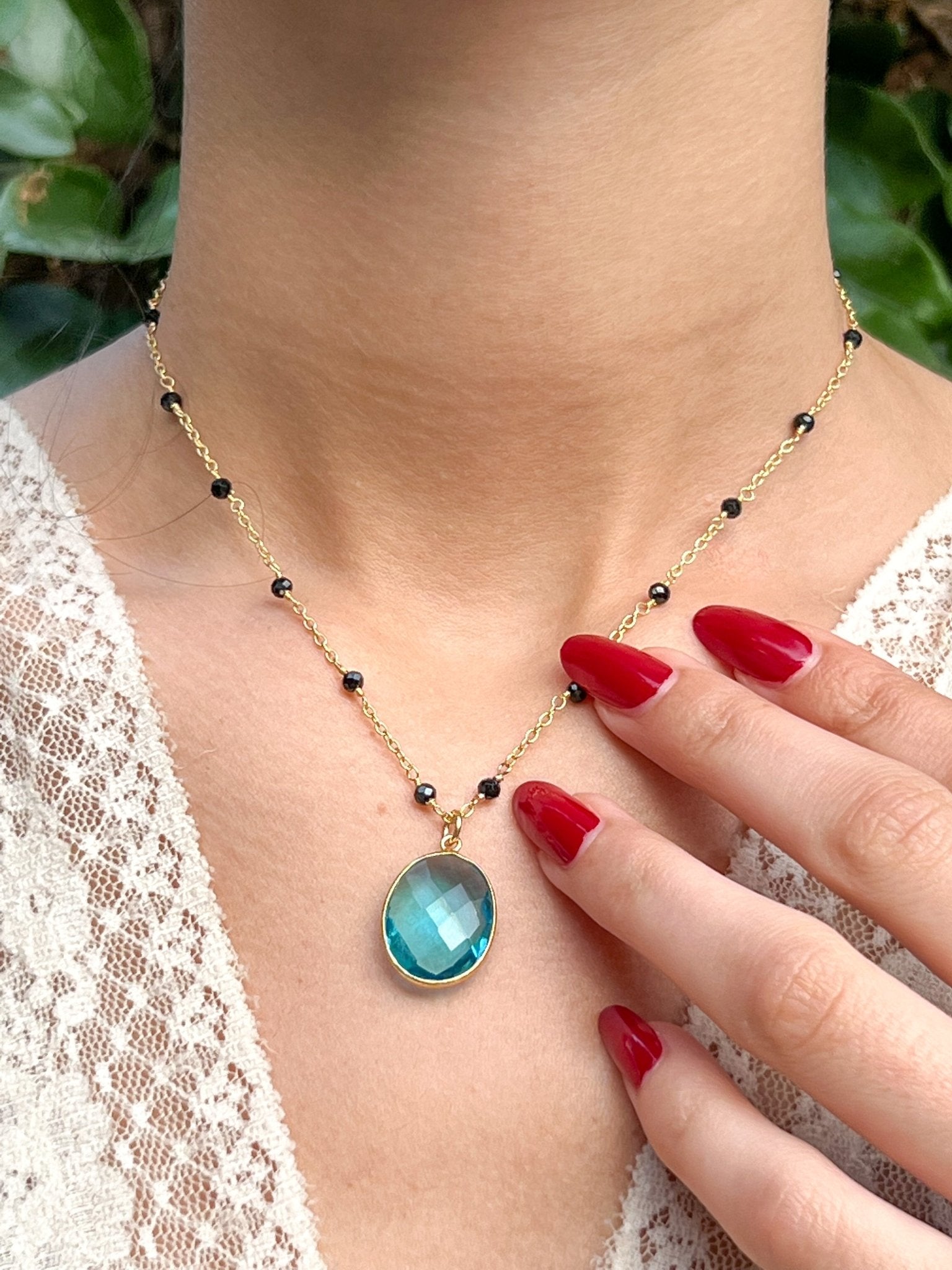 Blue Topaz Large Oval Pendant Necklace on Gold Chain with Black Onyx by Sage Machado - The Sage Lifestyle