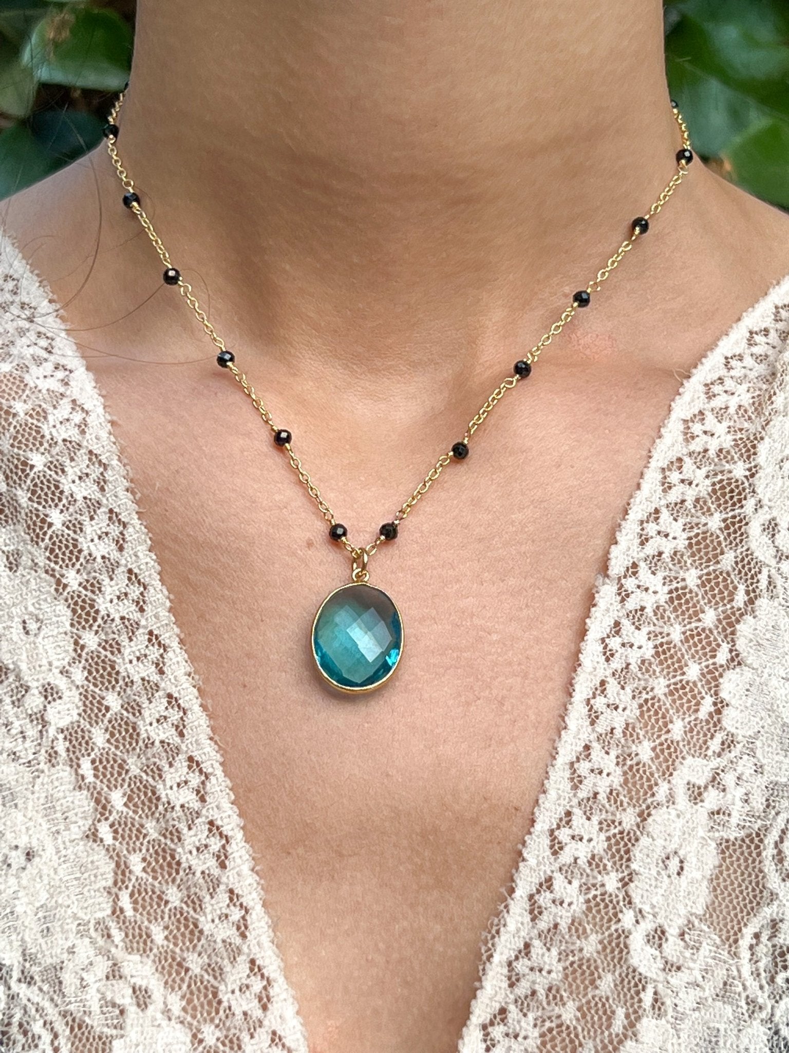 Blue Topaz Large Oval Pendant Necklace on Gold Chain with Black Onyx by Sage Machado - The Sage Lifestyle