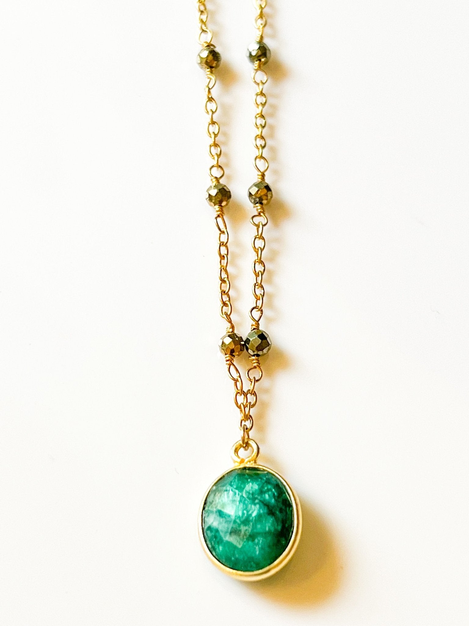 Raw Emerald Charm Drop Necklace on Gold Chain with Golden Pyrite by Sage Machado - The Sage Lifestyle