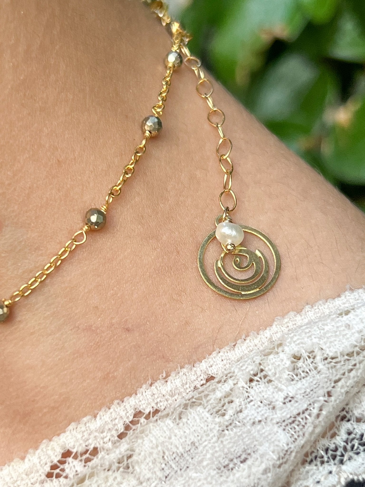 Raw Emerald Large Oval Pendant Necklace on Gold Chain with Golden Pyrite by Sage Machado - The Sage Lifestyle