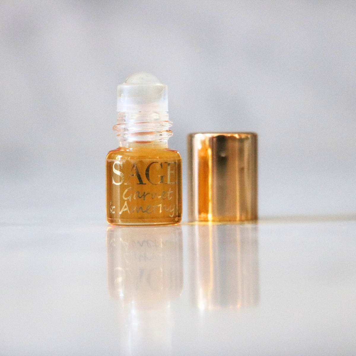 .03 oz Sage Mini Roll on Garnet and Amethyst Perfume Oil by Sage, dark floral, Gender Neutral, Vegan, Cruelty Free, travel size scent