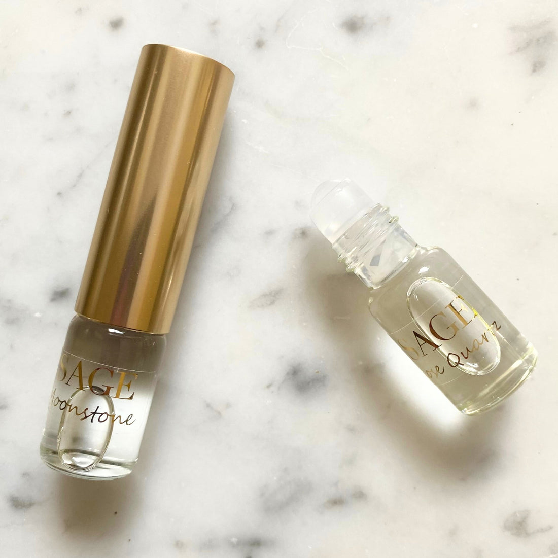 Rose Quartz &amp; Moonstone Organic 1/4 oz Eau de Toilette Dual Roll  with cap removed to show roll on detail