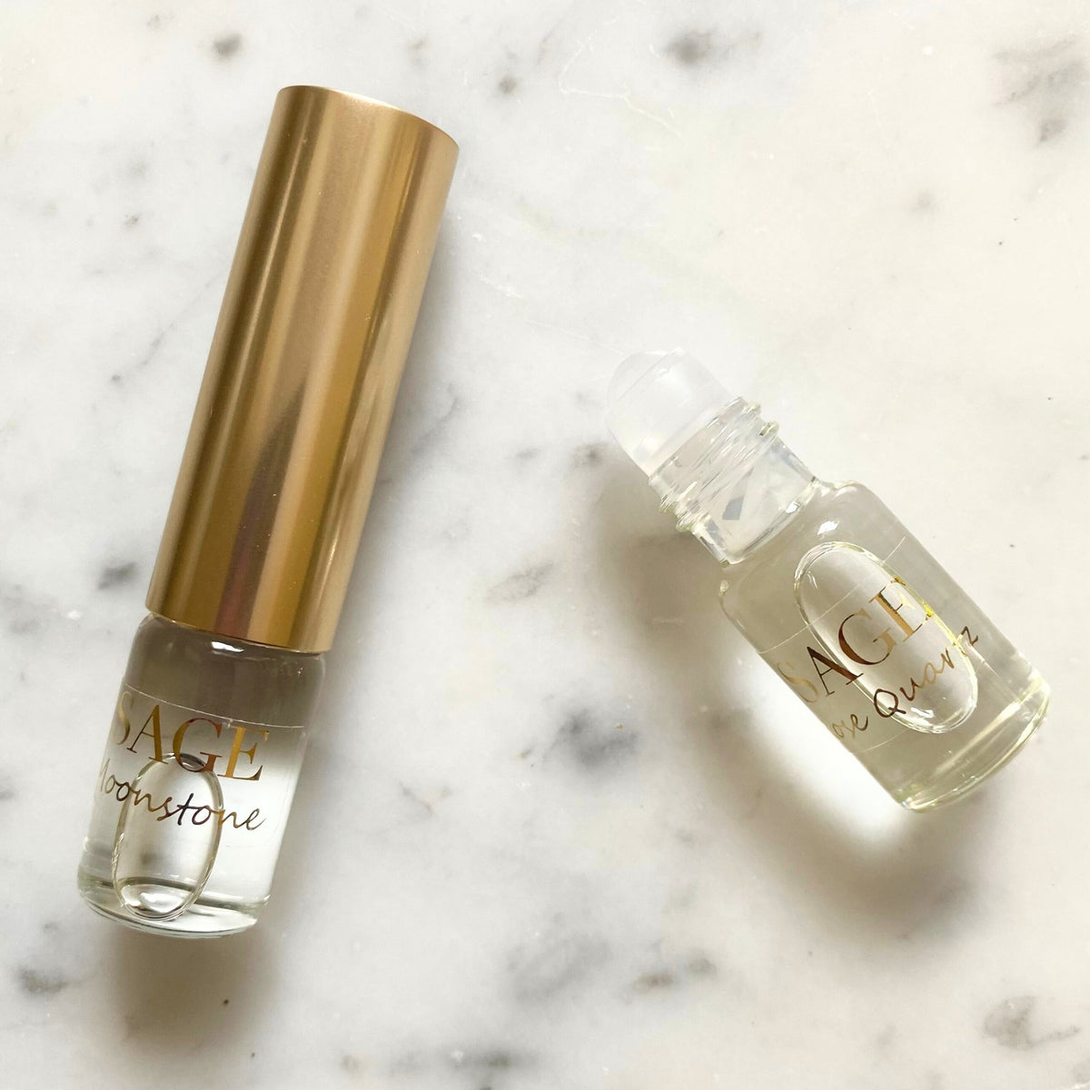 Rose Quartz &amp; Moonstone Organic 1/4 oz Eau de Toilette Dual Roll  with cap removed to show roll on detail