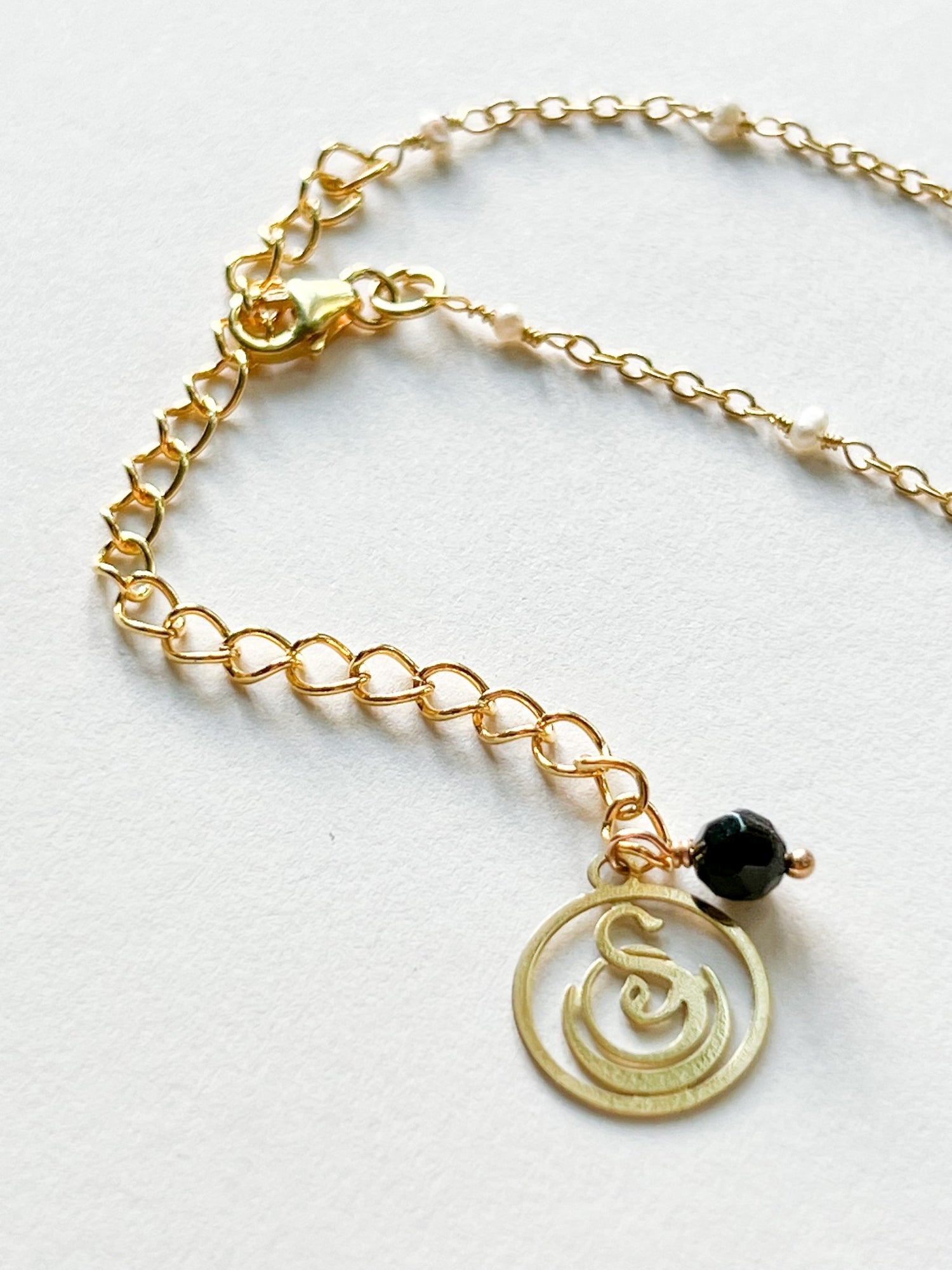 Black Onyx Oval Charm Necklace on Gold Chain with White Freshwater Pearls by Sage Machado - The Sage Lifestyle