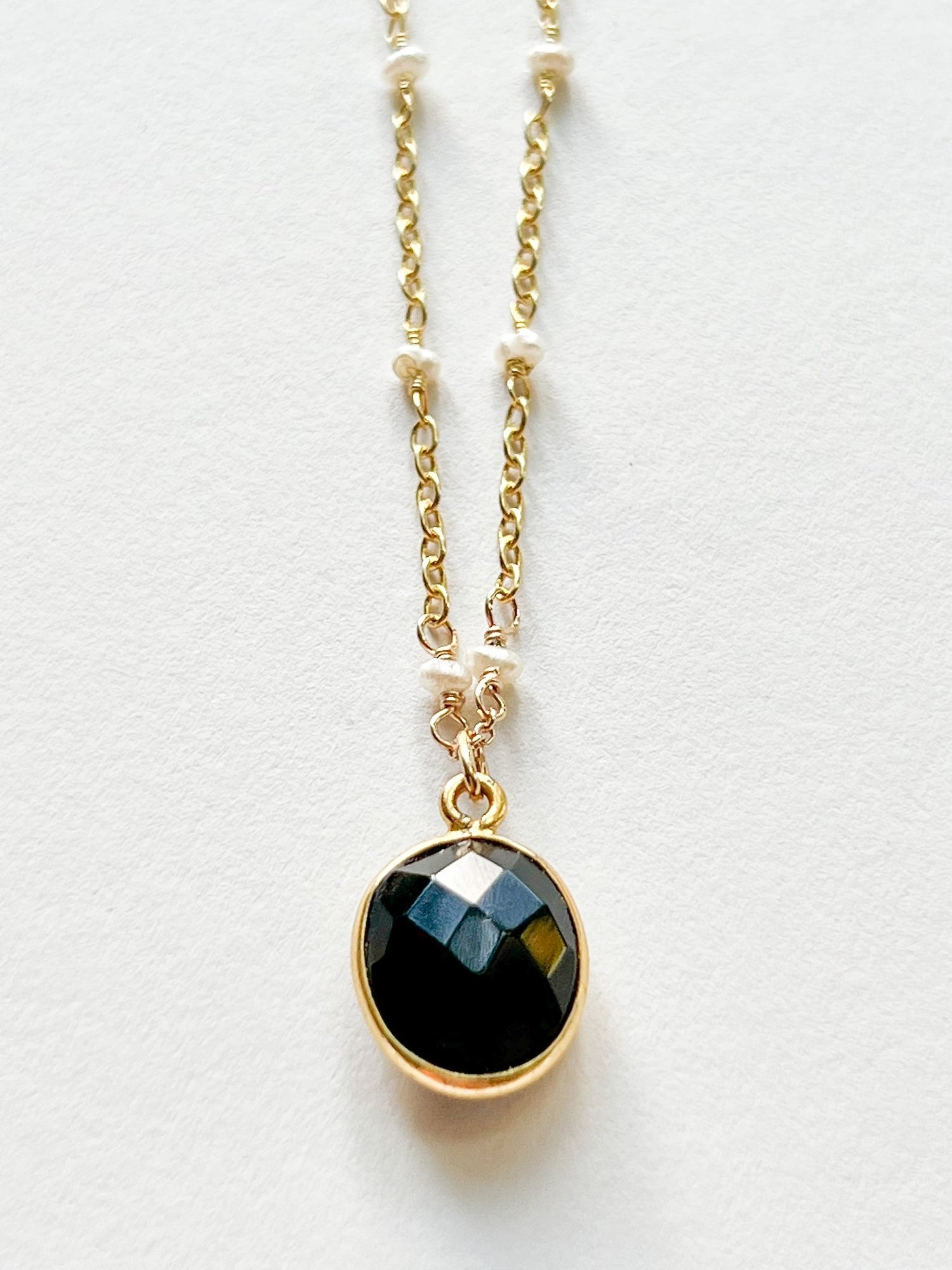 Black Onyx Oval Charm Necklace on Gold Chain with White Freshwater Pearls by Sage Machado - The Sage Lifestyle