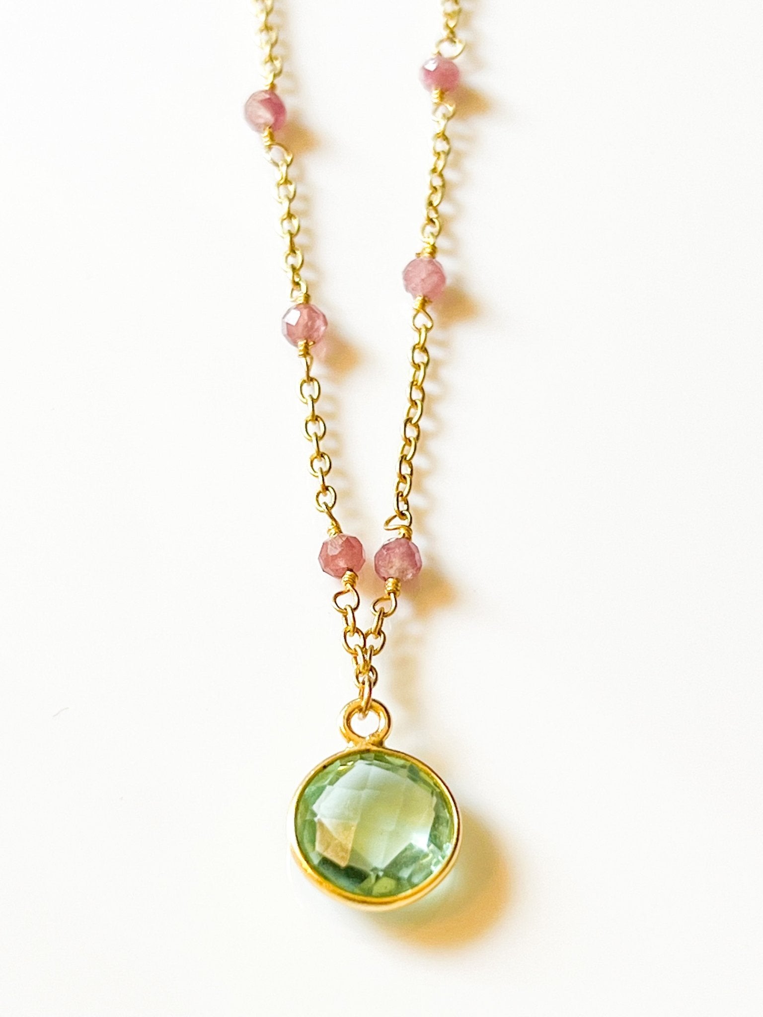 Blue Topaz Charm Drop Gold Necklace on Pink Tourmaline by Sage Machado - The Sage Lifestyle