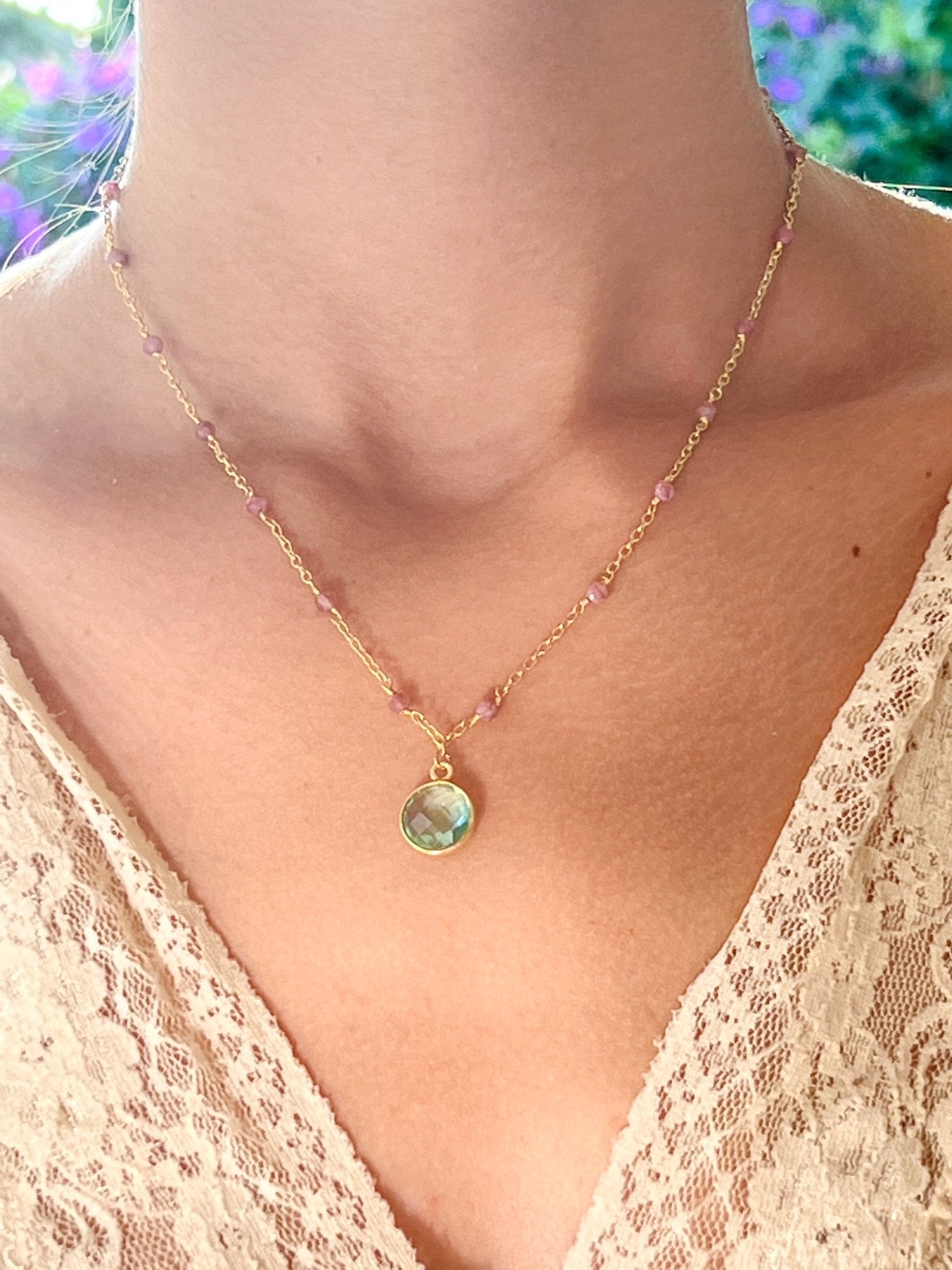 Blue Topaz Charm Drop Gold Necklace on Pink Tourmaline by Sage Machado - The Sage Lifestyle