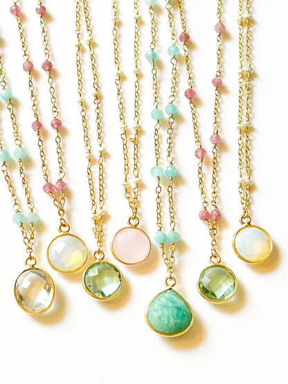 Blue Topaz Charm Drop Gold Necklace on Pink Tourmaline by Sage Machado - The Sage Lifestyle