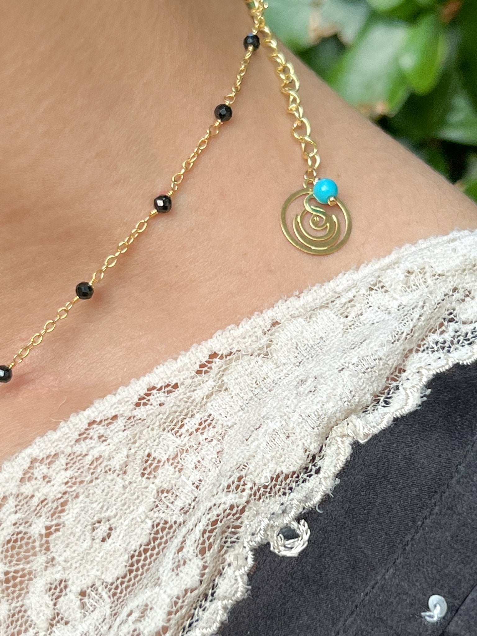 Blue Topaz Teardrop Charm Necklace on Gold Chain with Black Onyx by Sage Machado - The Sage Lifestyle