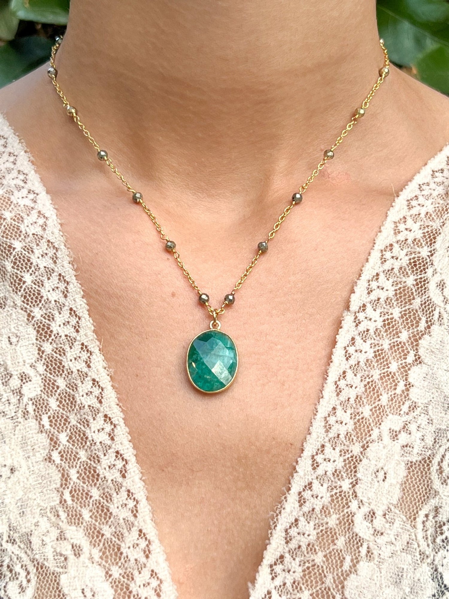 Raw Emerald Large Oval Pendant Necklace on Gold Chain with Golden Pyrite by Sage Machado - The Sage Lifestyle