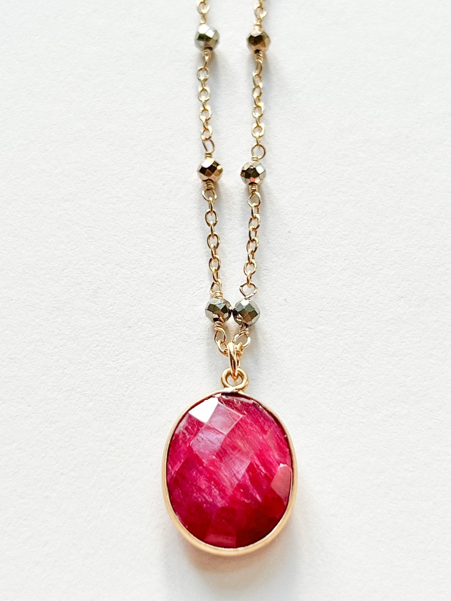 Raw Ruby Large Oval Pendant Necklace on Gold Chain with Golden Pyrite by Sage Machado - The Sage Lifestyle