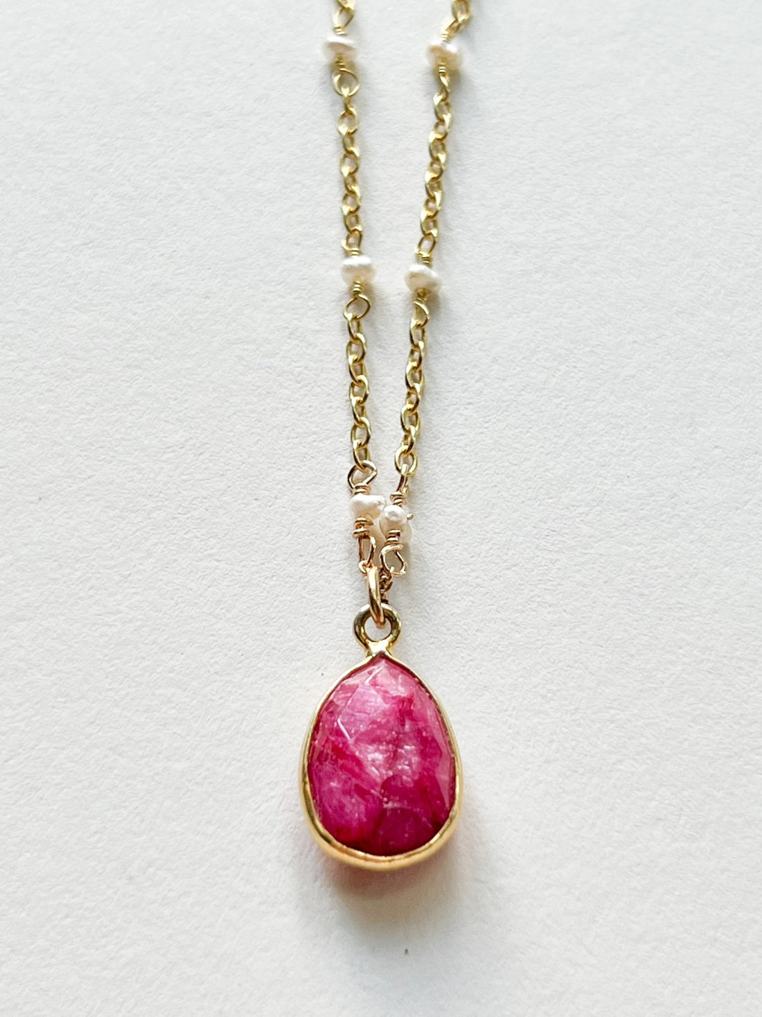 Raw Ruby Teardrop Charm Necklace on Gold Chain with White Freshwater Pearls by Sage Machado - The Sage Lifestyle