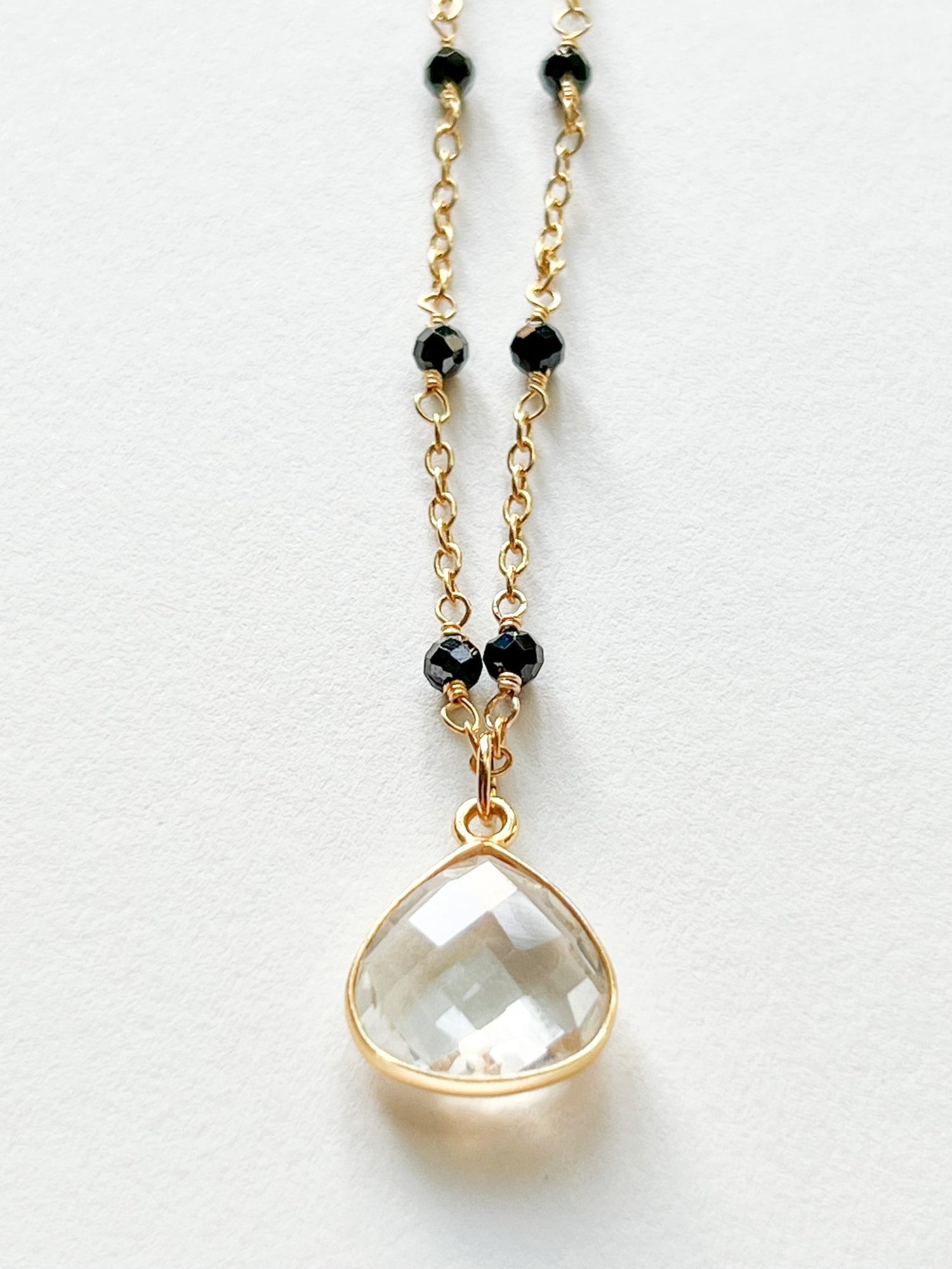 Rock Quartz Teardrop Charm Necklace on Gold Chain with Black Onyx by Sage Machado - The Sage Lifestyle